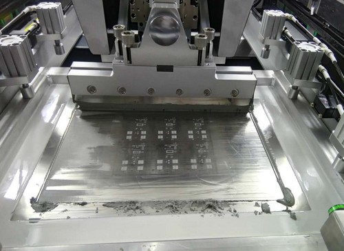 Auto Solder Paste Printer printing the board
