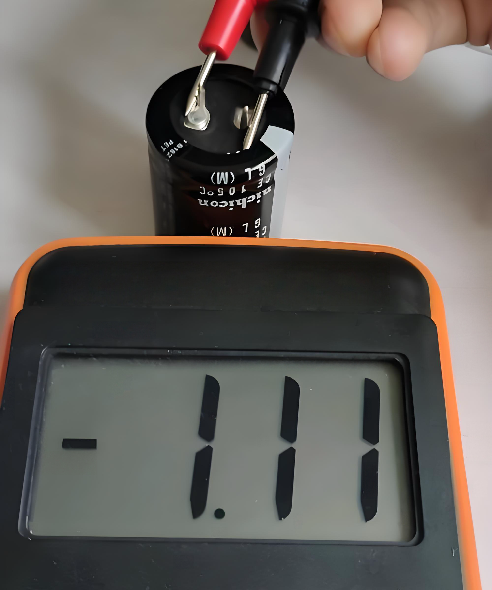 Which Is Positive and Negative in Capacitor Symbol?