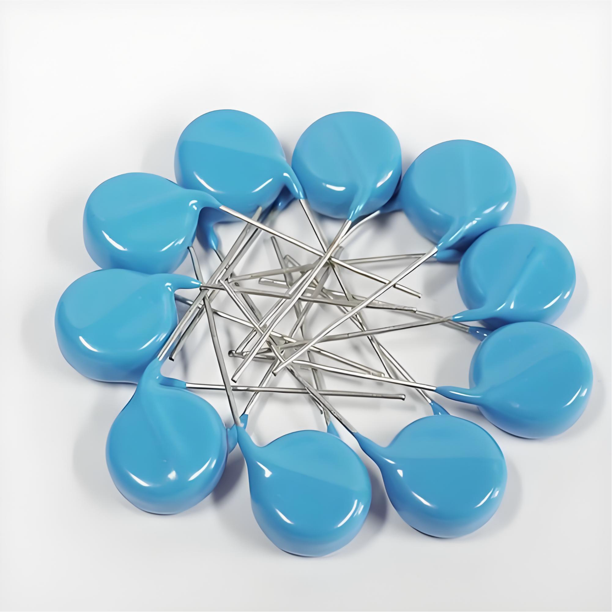 Which Is Positive and Negative in Capacitor Symbol?