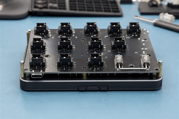 Hot-swap custom number pad PCB showing switch socket, stabilizer and enclosure clearance