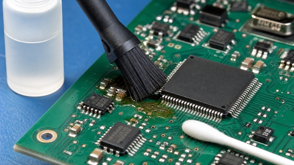 Controlled flux removal from a PCB after soldering