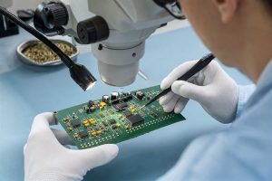 Human visual inspection of solder joints under a microscope