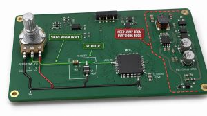 Potentiometer PCB layout showing a short wiper trace, RC filter near the MCU ADC, and separation from a switching node