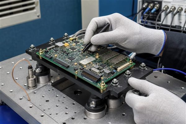 PCB Fabrication for Harsh Environments, inspection on a vibration test fixture