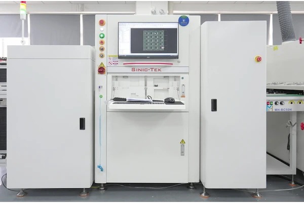Automated PCB assembly, enclosed SINIC-TEK optical inspection station and monitor photographed on the BestPCBS website