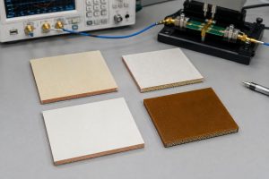 Four distinct laminate sample coupons representing common high-speed PCB material families