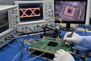OTDM PCB testing with oscilloscope probes optical interface and inspection equipment