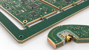 Panelized circuit boards showing plated routed edges, support tabs and connector keep-outs