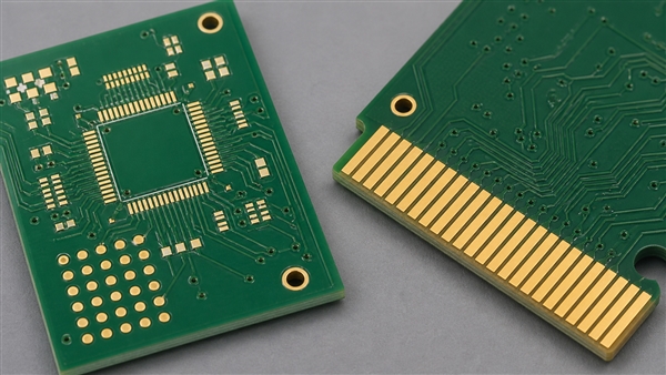 PCB immersion gold solder-pad sample beside an illustrative hard-gold edge-contact board