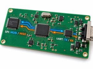 SPI MOSI and MISO routing with UART TX and RX connections on a PCB