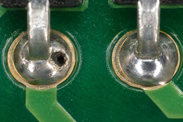 Macro comparison of a solder blow hole and an intact through-hole solder joint