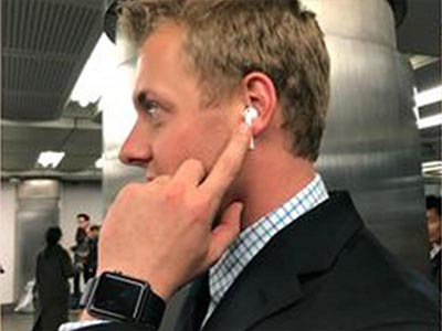 A young man and AirPods